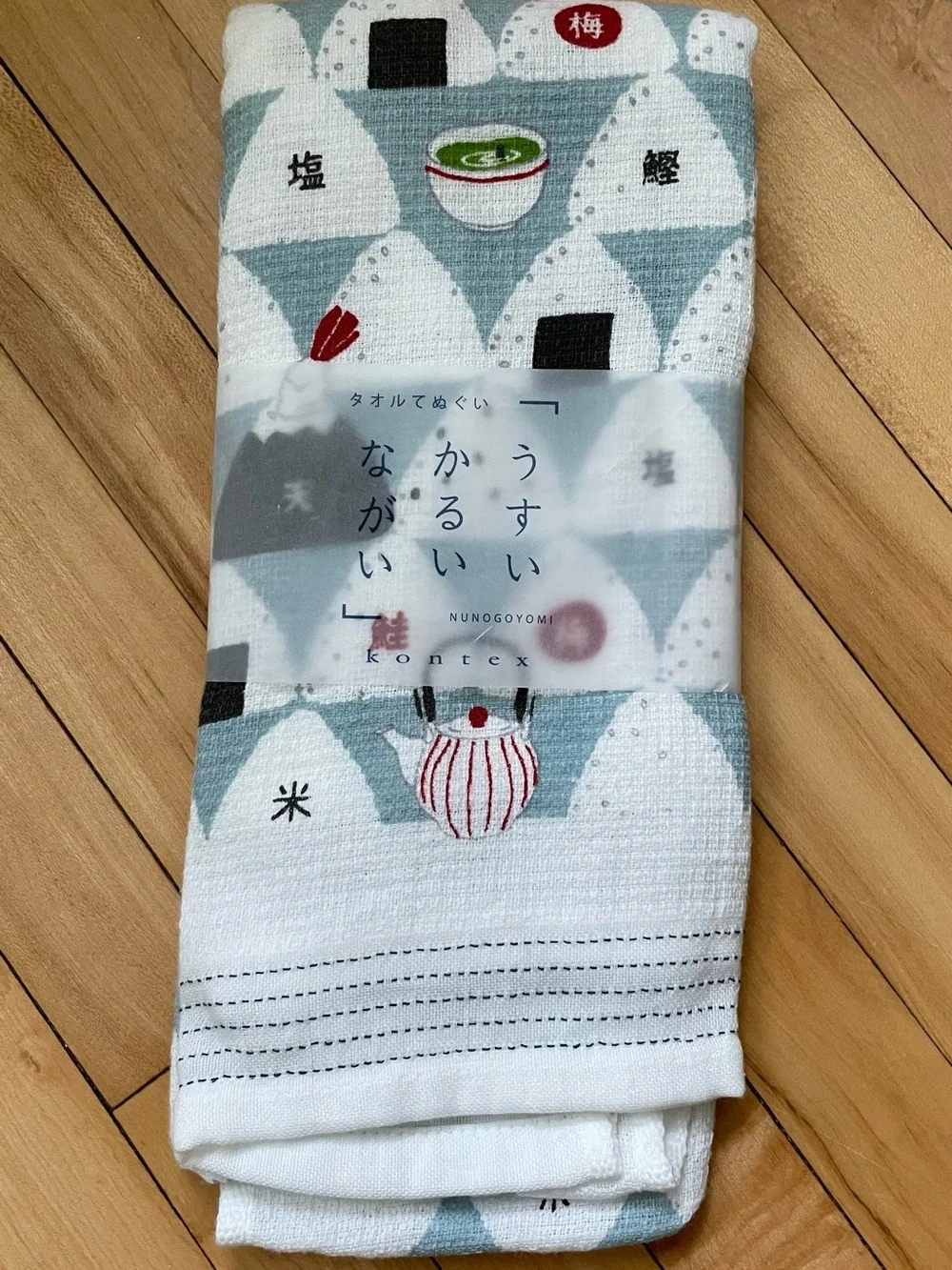 Kodomo Japanese Onigiri Tea Towel with white and blue triangular rice ball